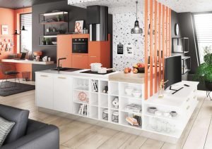 Modern kitchen and living area with orange accents, open shelves, and a partition wall.