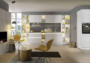 Modern kitchen with white cabinets, open shelves, and yellow accents.