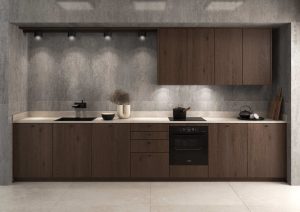 Modern kitchen with dark wood cabinets, light countertop, and gray backsplash.